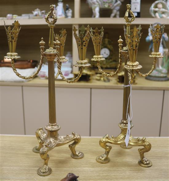 A pair of three branch candlesticks